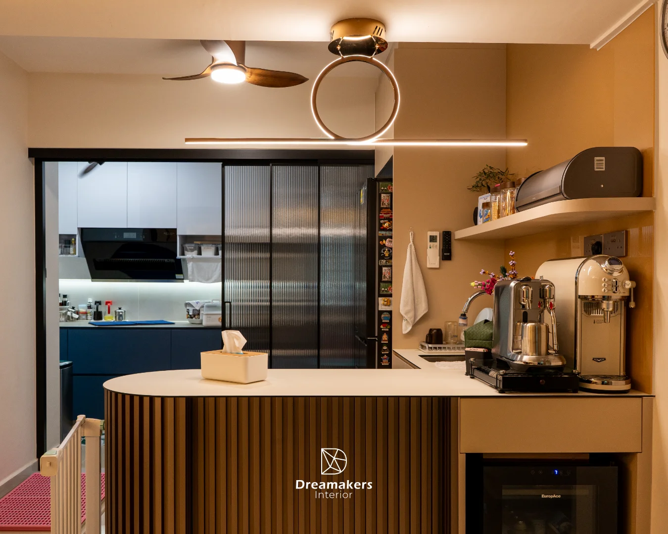 Coffee bar counter with fluted wood base and rose-gold ring pendant in a 5-room resale renovation at Anchorvale Link, Sengkang