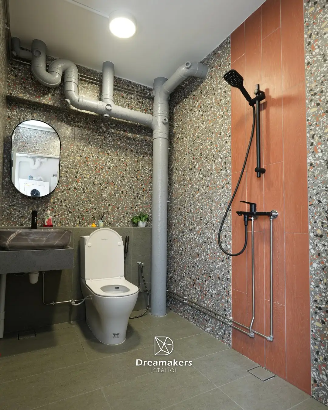 Terrazzo-tiled bathroom with terracotta plank accent and black shower set, 332 Tampines Street 32