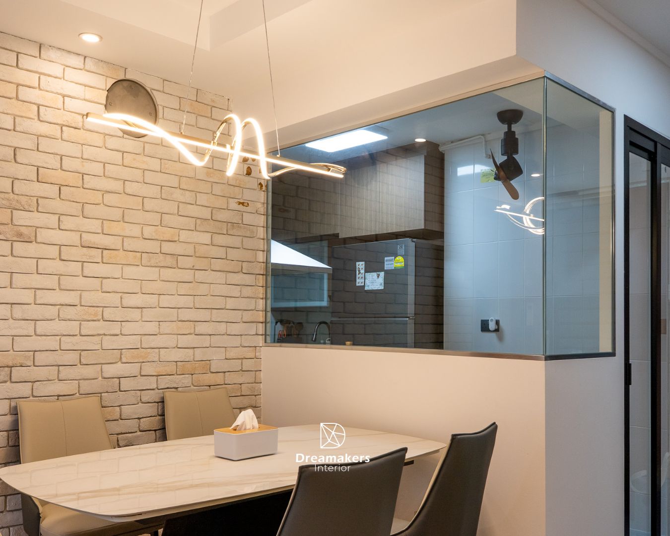 Sculptural pendant light over the dining table with glass-framed kitchen behind, Chai Chee HDB