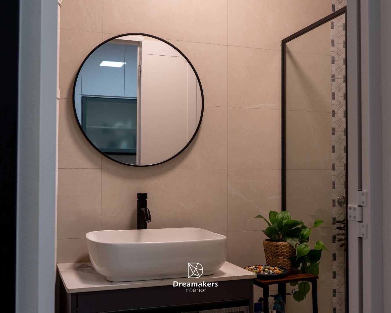 Bathroom with stone-look tiles, round mirror and black fittings, Lengkong Tiga resale HDB