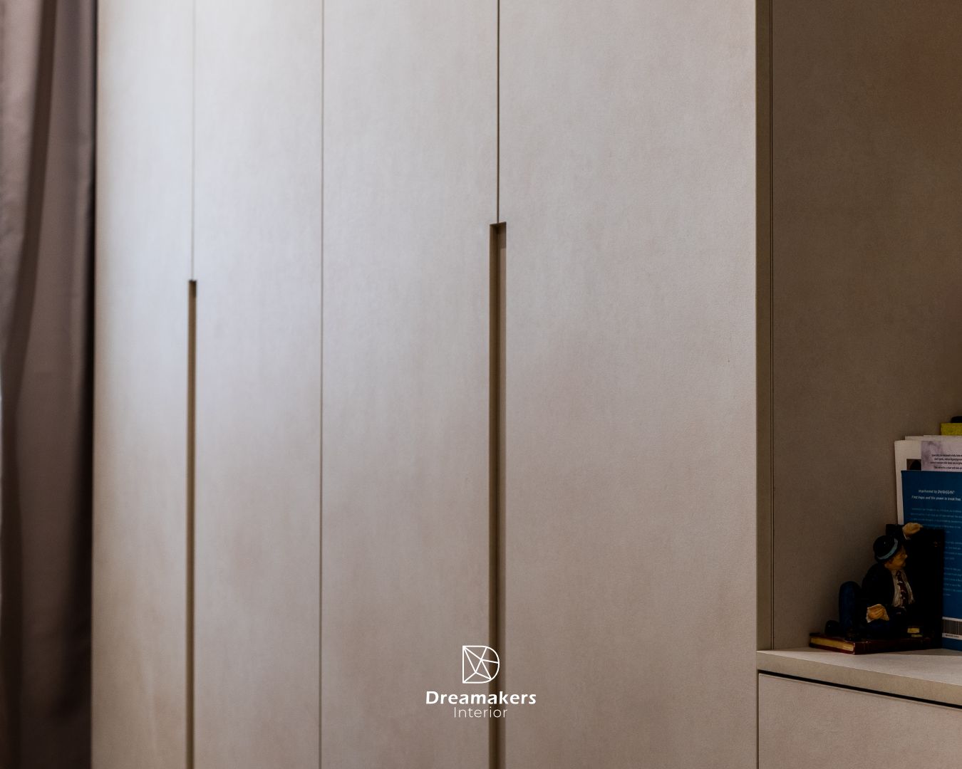 Full-height handle-less wardrobes in a 4-room resale renovation at Lengkong Tiga