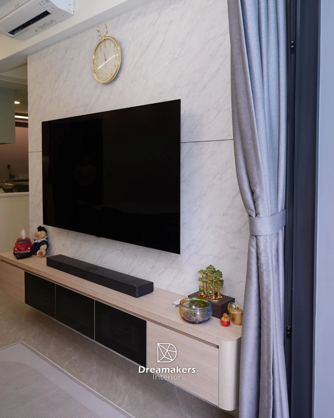 Marble-look TV feature wall with oak console and soundbar, Parc Canberra executive condo renovation