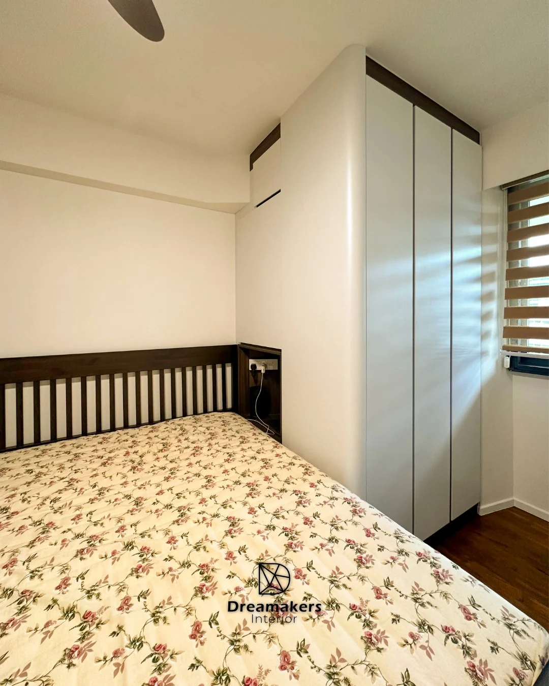 Bedroom with white full-height wardrobes, walnut bedside niche and original timber flooring, Punggol Walk HDB resale renovation