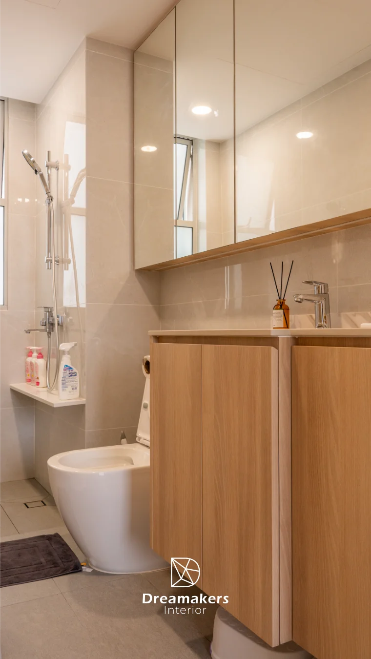 Bathroom with stone-look wall tiles and warm lighting, The Eden condominium Singapore