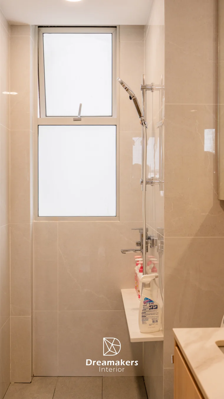 Vanity and mirror cabinet in the renovated bathroom, The Eden condo interior design