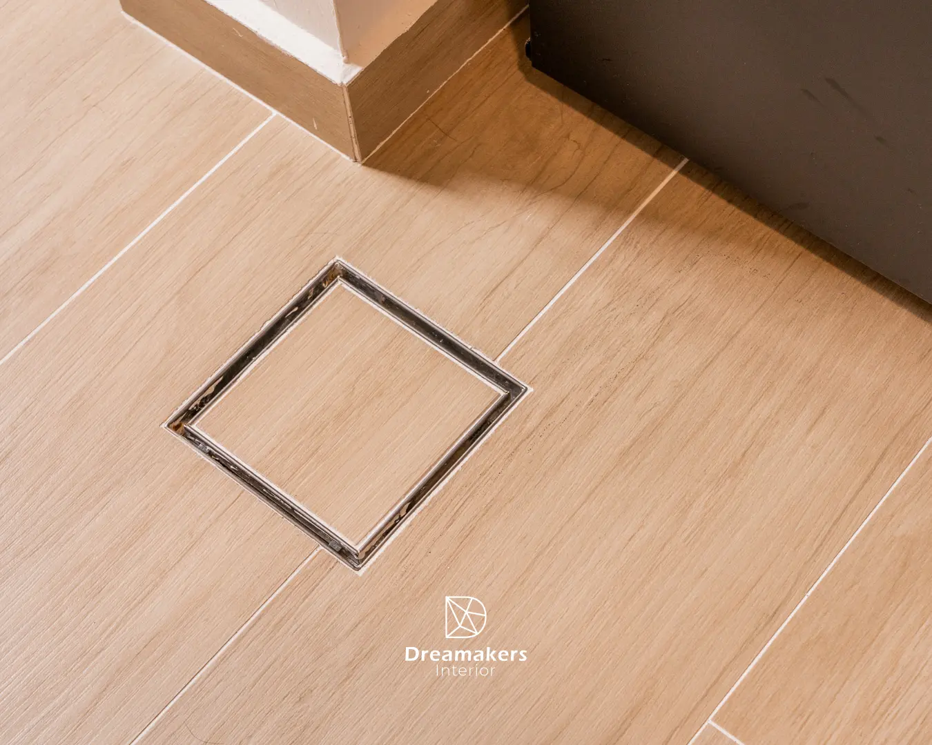 Custom kitchen carpentry in light oak laminate at The Eden condominium, Draycott Park
