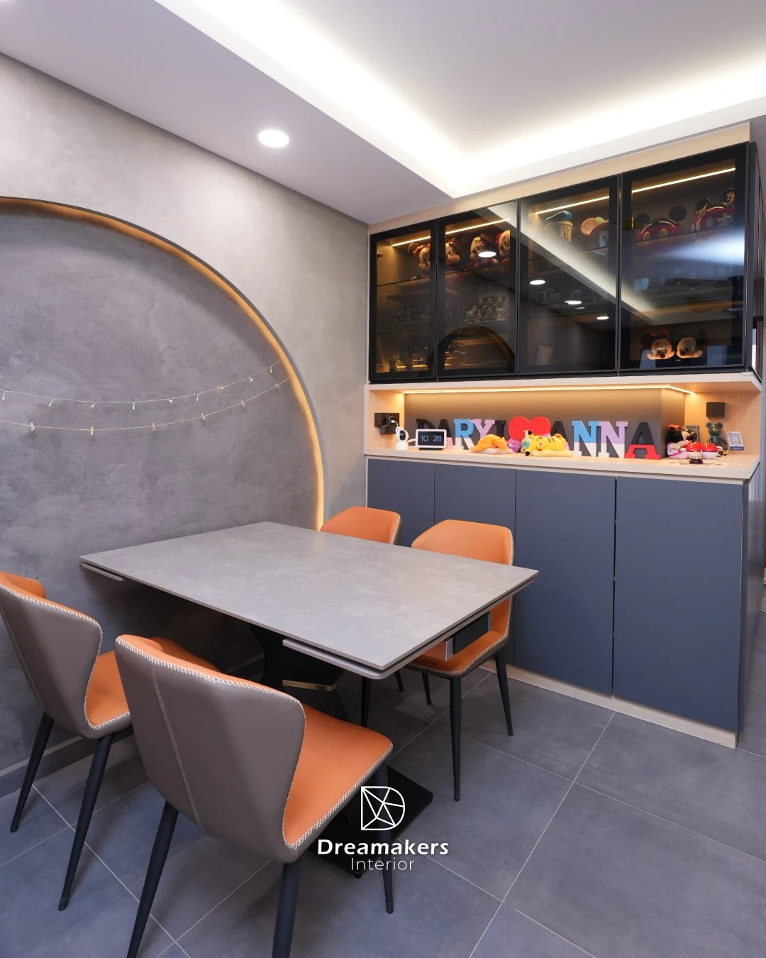 Dining area with arched backlit microcement wall and burnt-orange chairs, Woodleigh Link resale HDB Bidadari