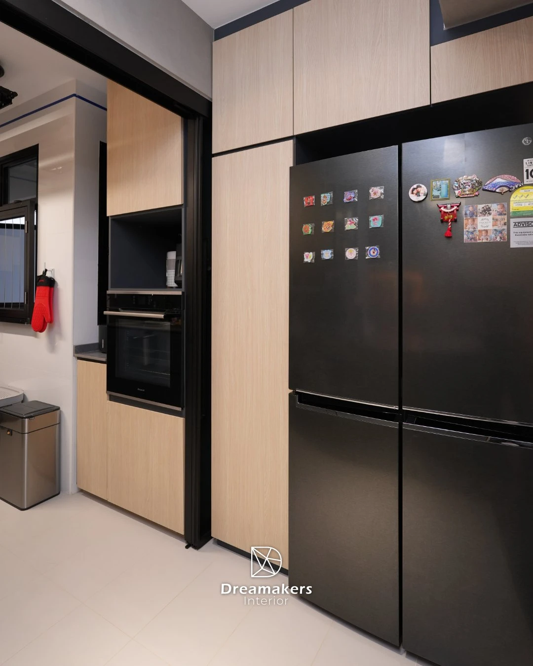 Tall oak kitchen units with built-in oven, coffee nook and matte black fridge, 206D Woodleigh Link renovation