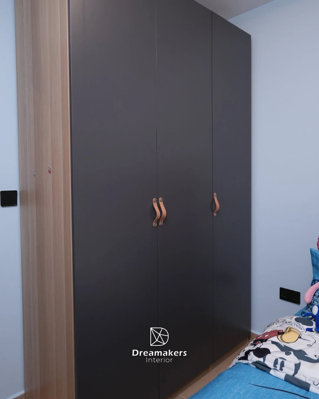 Kids' room in powder blue with charcoal wardrobe and tan leather handles, 206D Woodleigh Link resale renovation